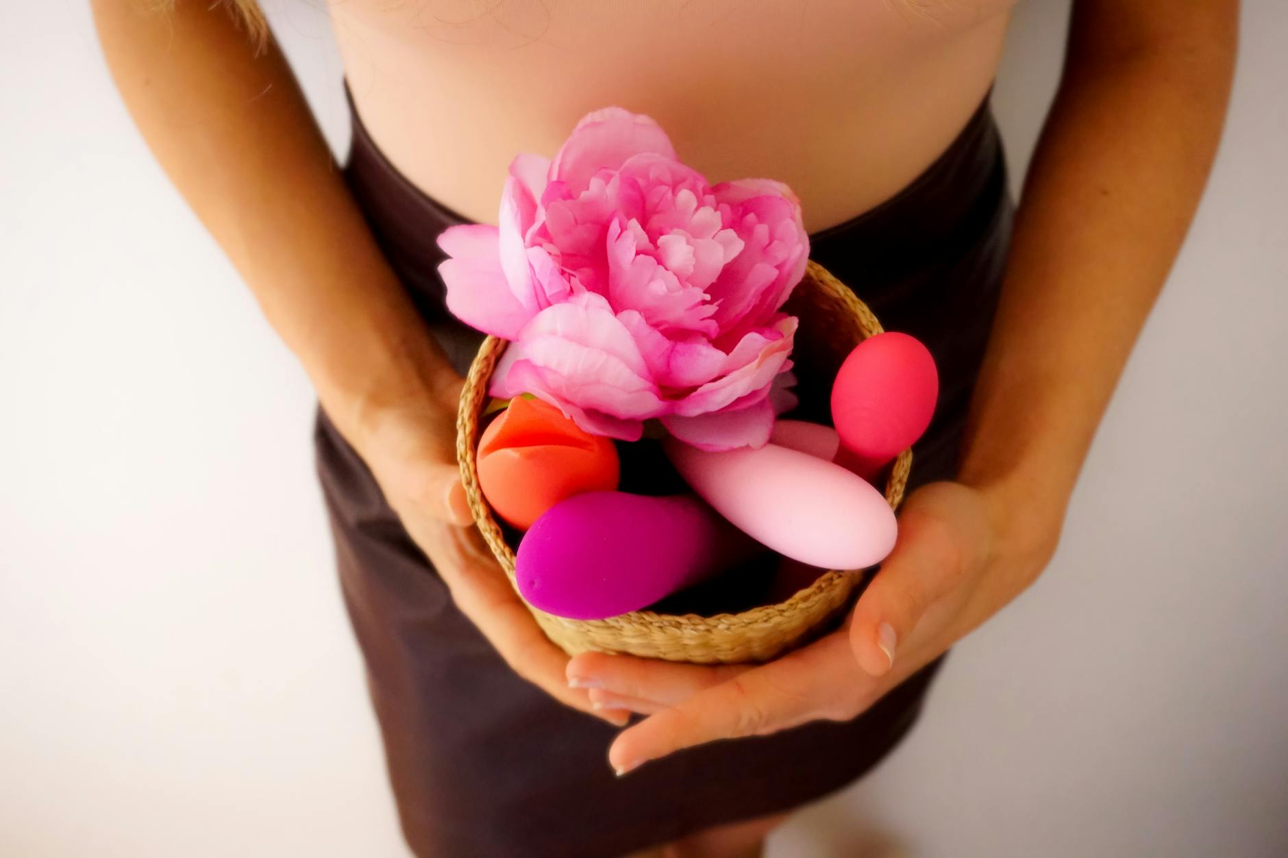 Fresh lemons in cupped hands on a brown surface, symbolizing the gentle, nourishing approach to sensation recovery
